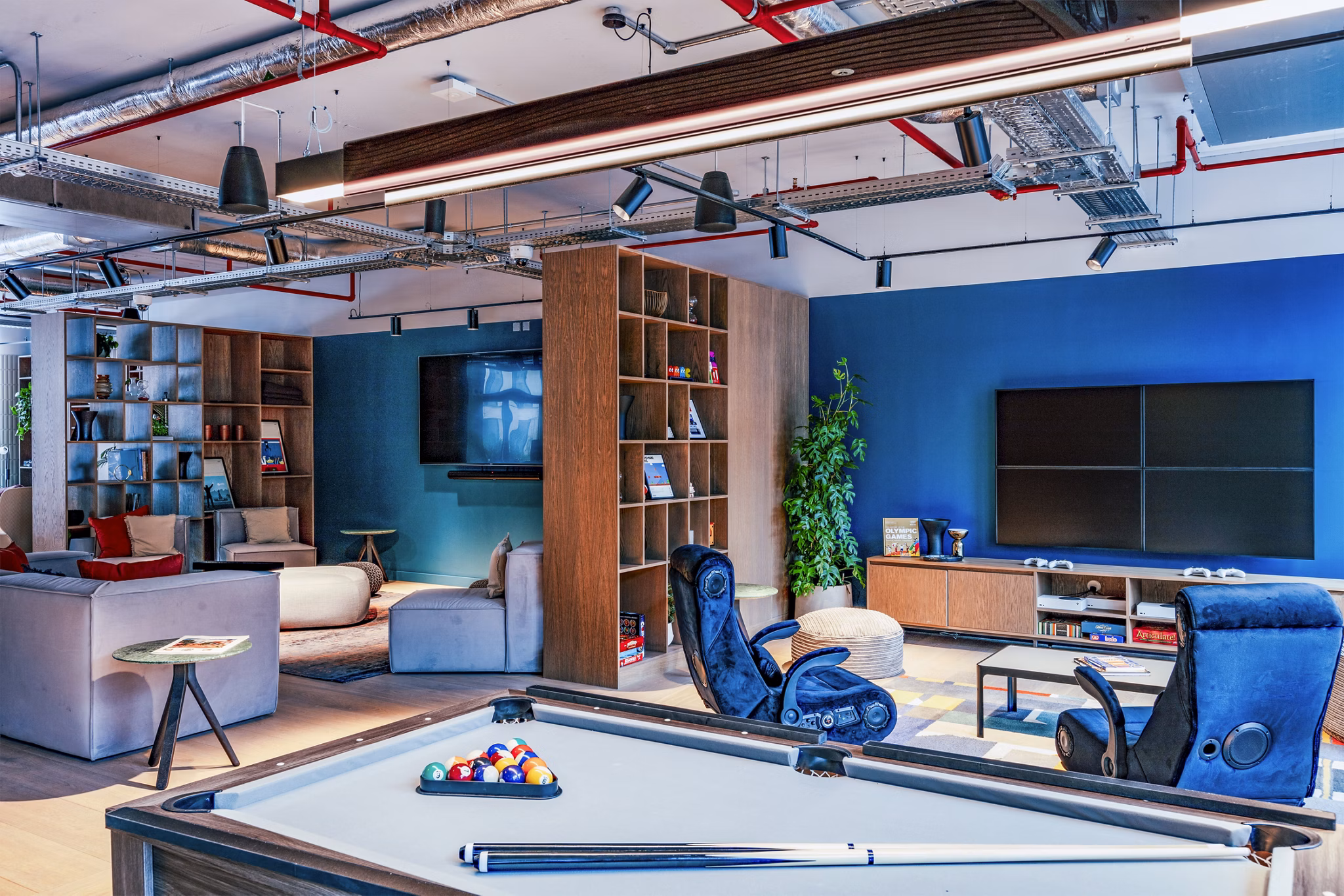 clubhouse game room at Coppermaker Square Apartments