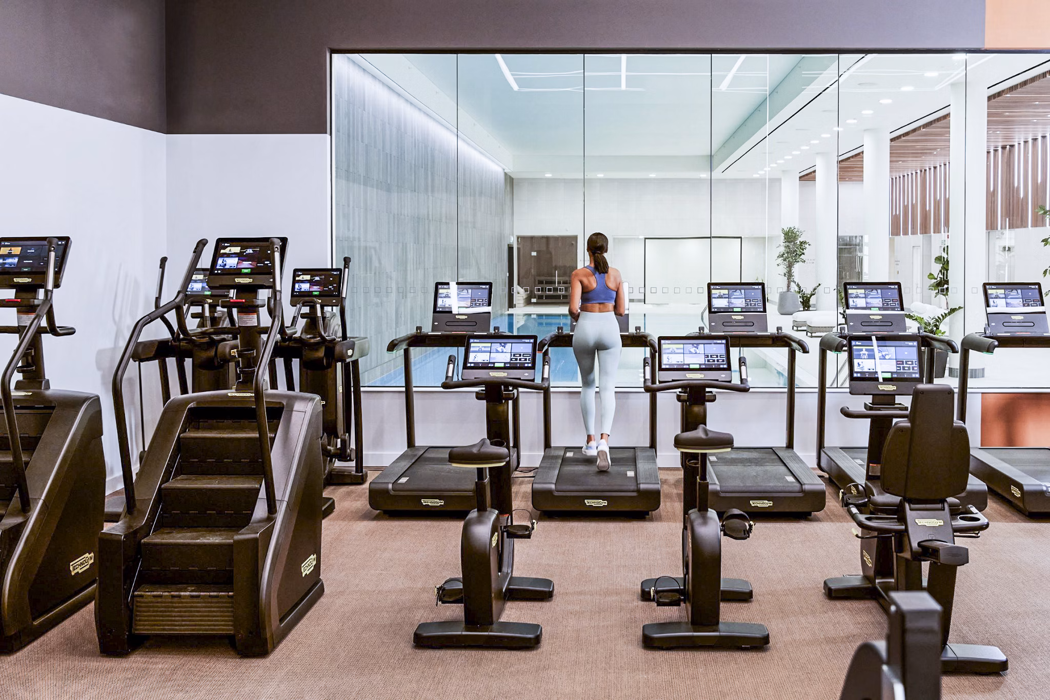 fitness center at Coppermaker Square Apartments
