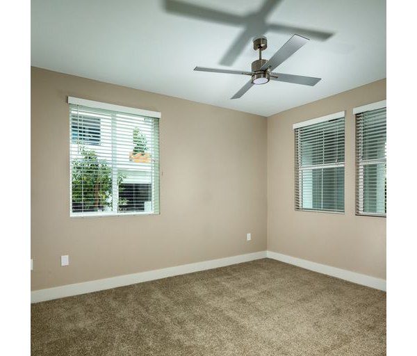 Bedroom featuring elegant furnishings at The Core on Foothill Apartments