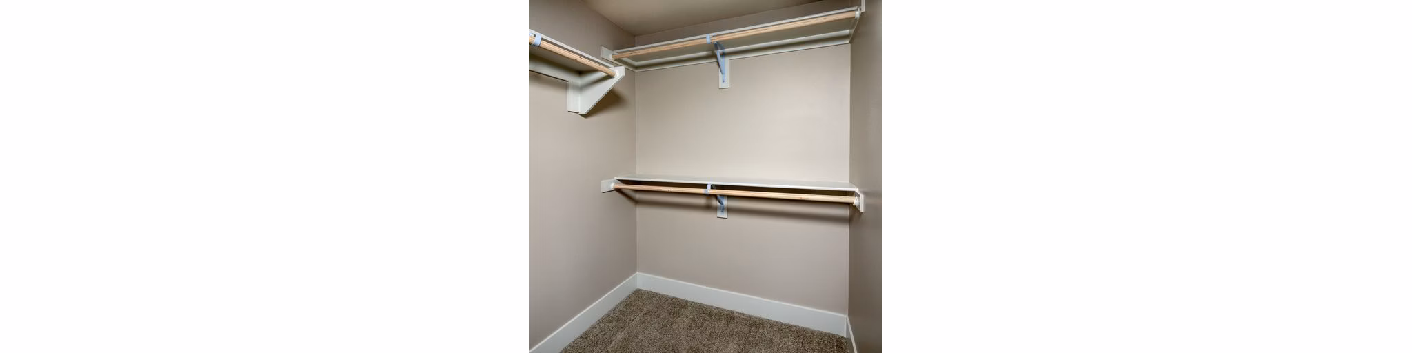 Closet with custom shelving and ample storage space at The Core on Foothill Apartments