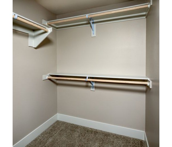 Closet with custom shelving and ample storage space at The Core on Foothill Apartments