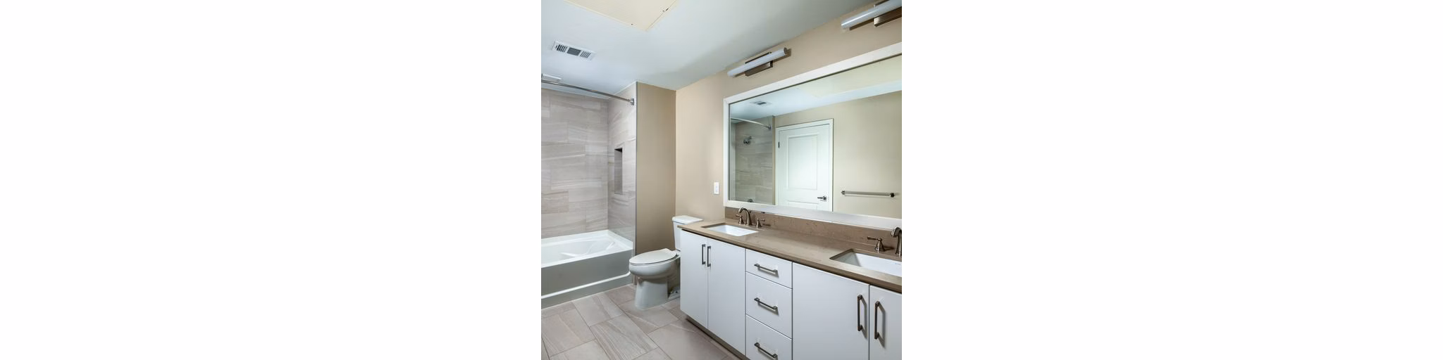 Bathroom featuring modern fixtures and sleek design at The Core on Foothill Apartments