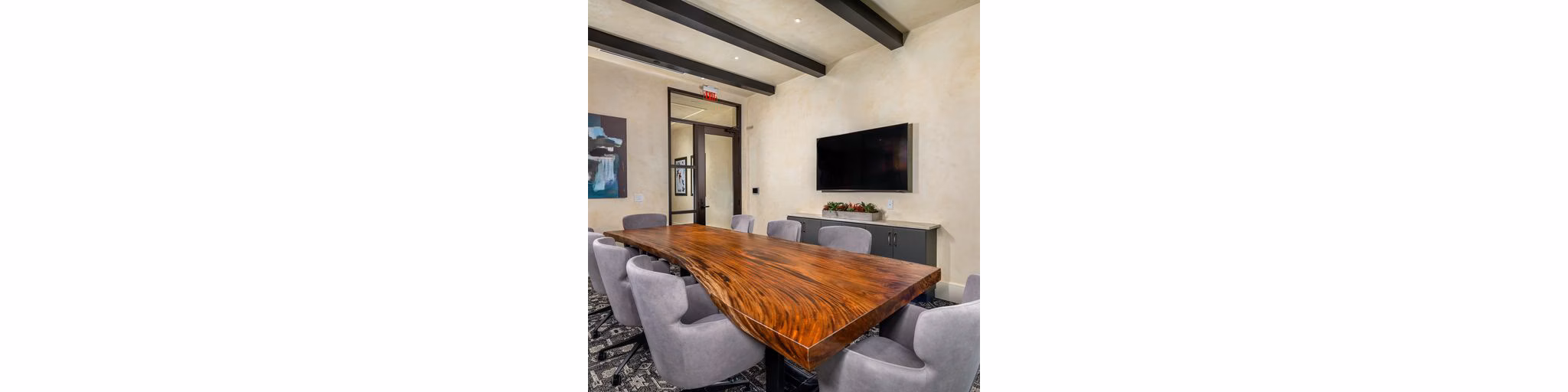 Modern meeting facility with high-tech amenities at The Core on Foothill Apartments, perfect for residents and guests