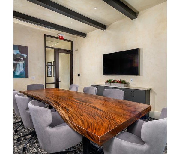 Modern meeting facility with high-tech amenities at The Core on Foothill Apartments, perfect for residents and guests