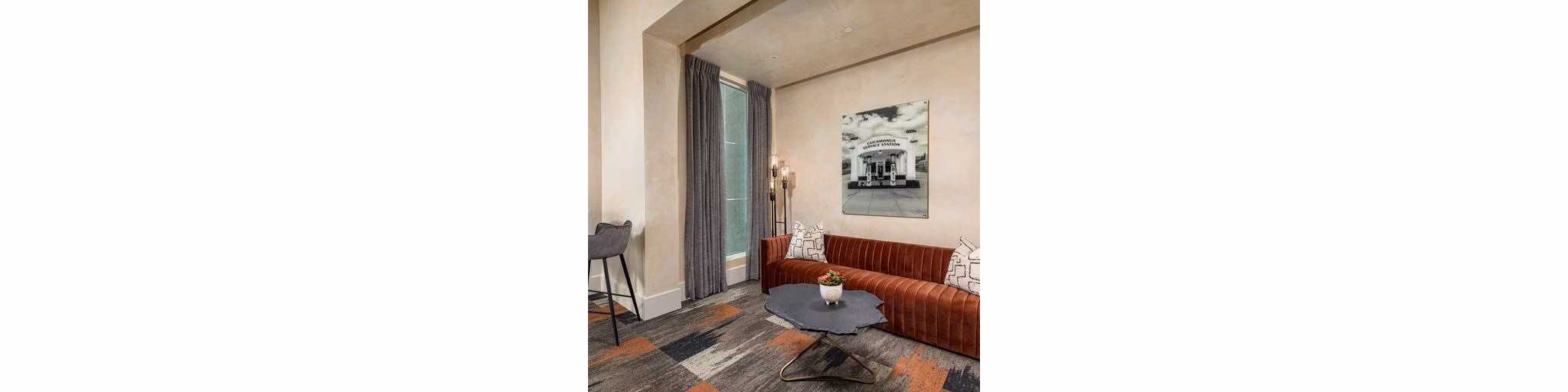 Clubhouse featuring modern furnishings at The Core on Foothill Apartments, luxury living by Greystar