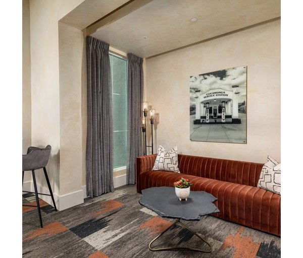 Clubhouse featuring modern furnishings at The Core on Foothill Apartments, luxury living by Greystar
