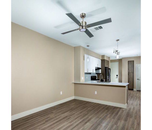 Dining area with modern decor at The Core on Foothill Apartments featuring elegant lighting and sleek furnishings