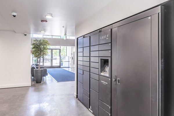 Parcel locker system at Prescott Apartments for secure package delivery solutions