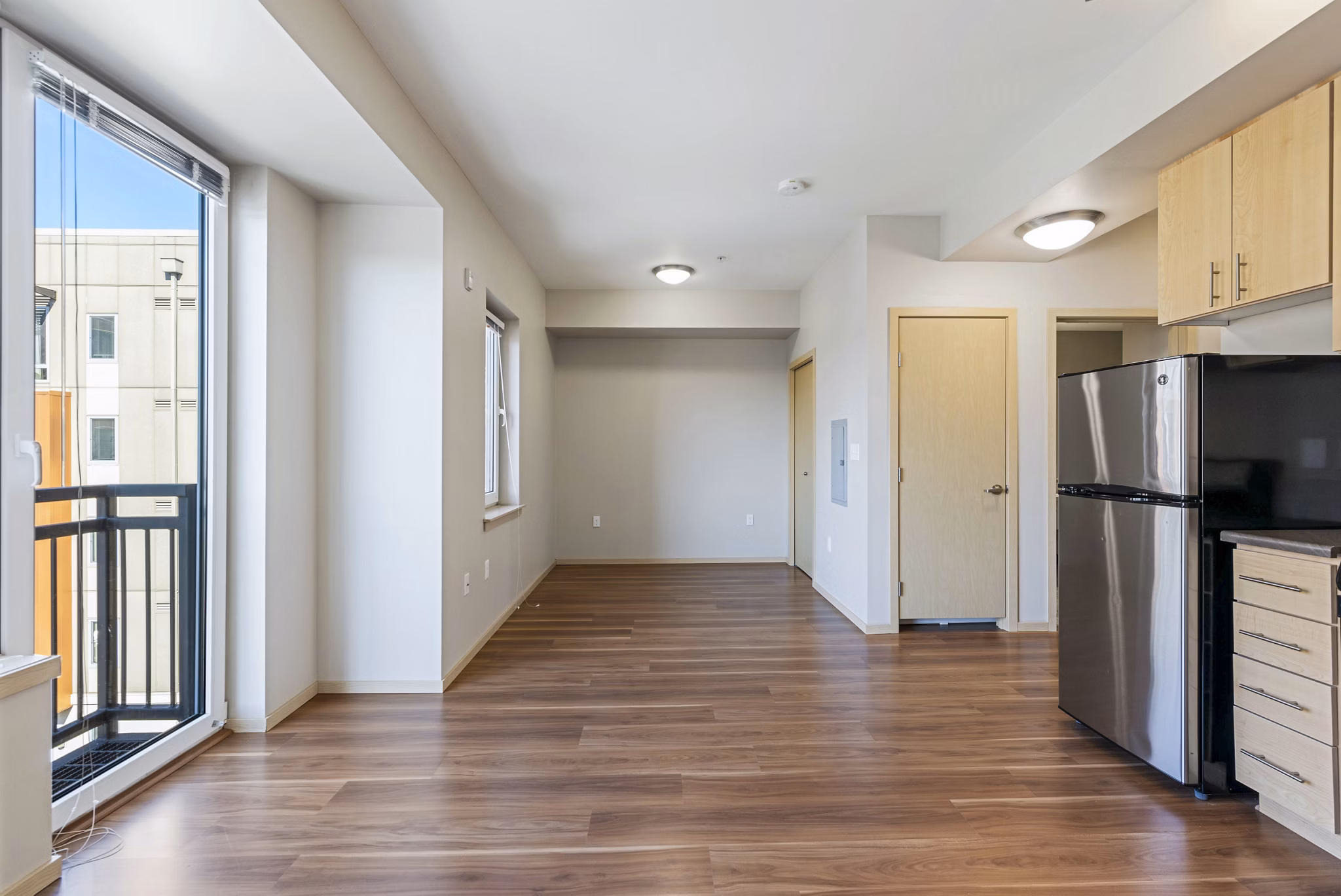 Dining room featuring elegant decor and modern lighting in Prescott Apartments