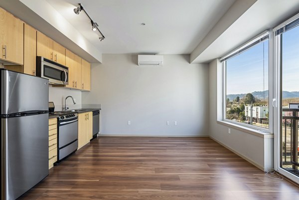 Dining area with modern decor at Prescott Apartments, perfect for hosting family meals in this Greystar luxury apartment community