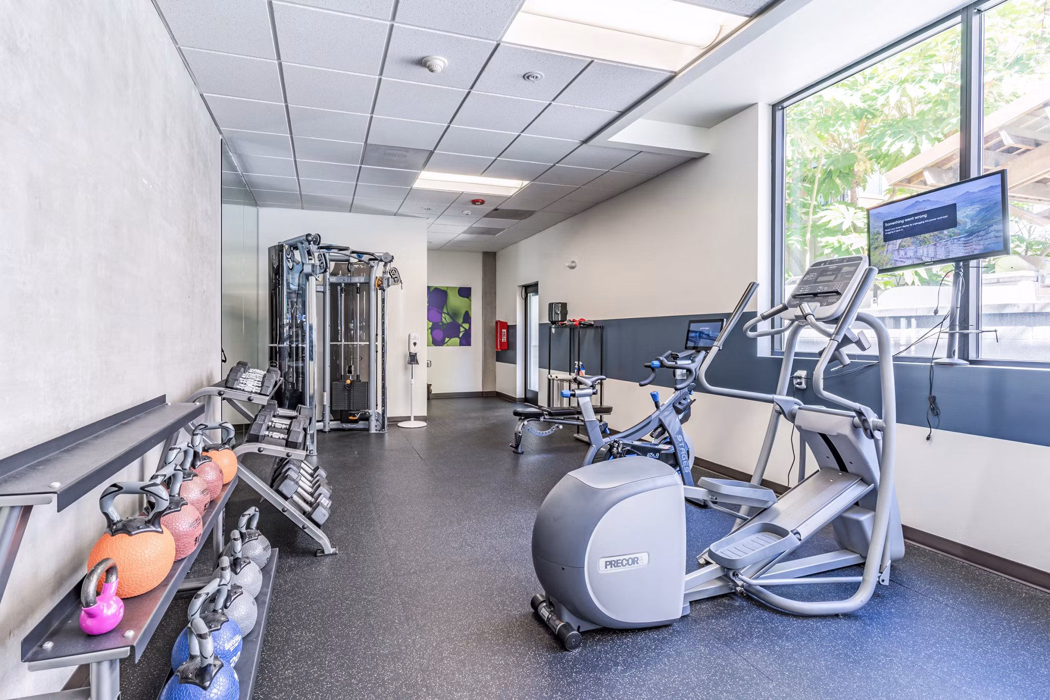 Fitness center with modern equipment at Prescott Apartments