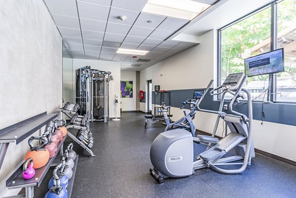 Fitness center with modern equipment at Prescott Apartments