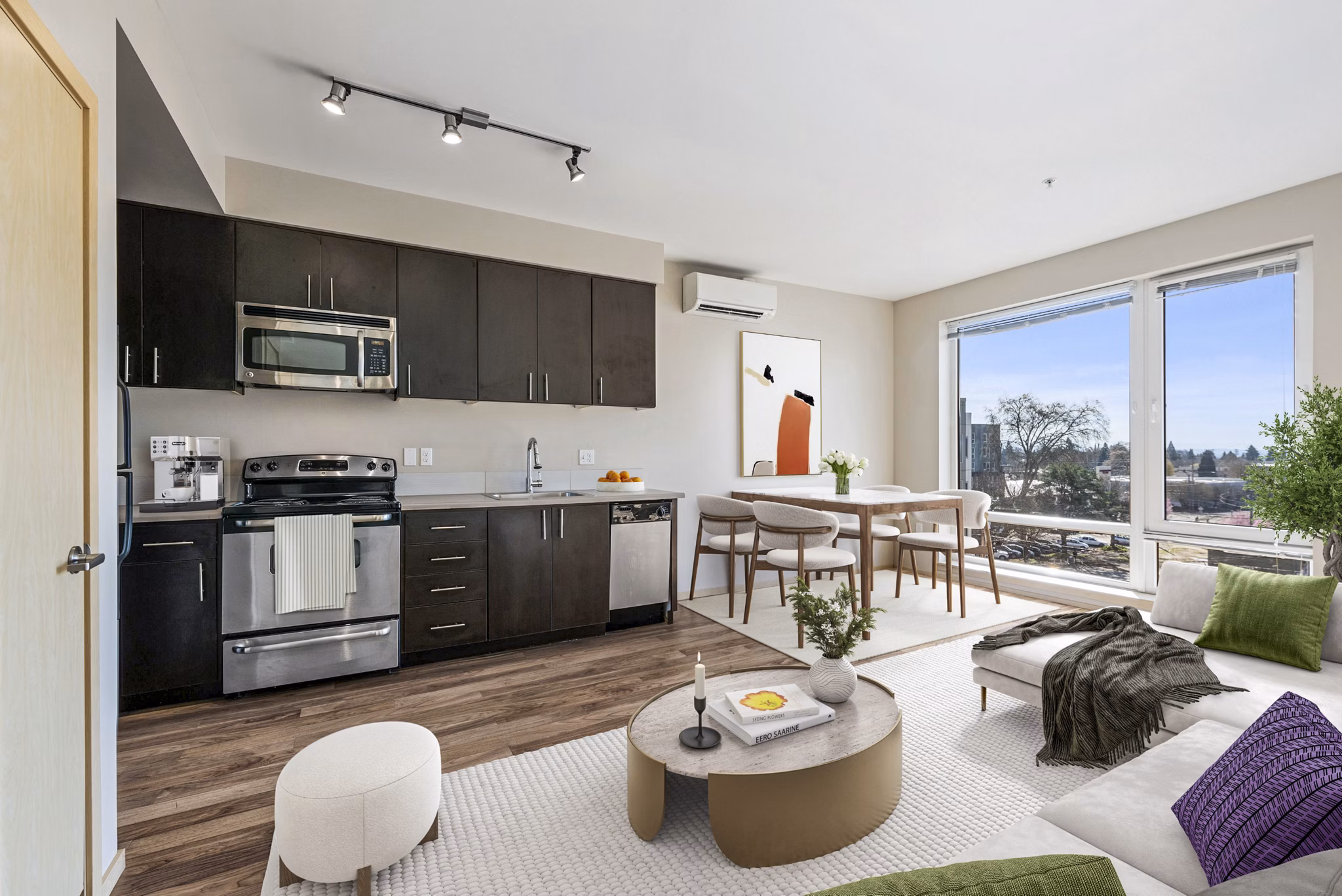 Modern kitchen with stainless steel appliances at Prescott Apartments