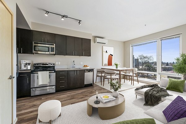 Modern kitchen with stainless steel appliances at Prescott Apartments
