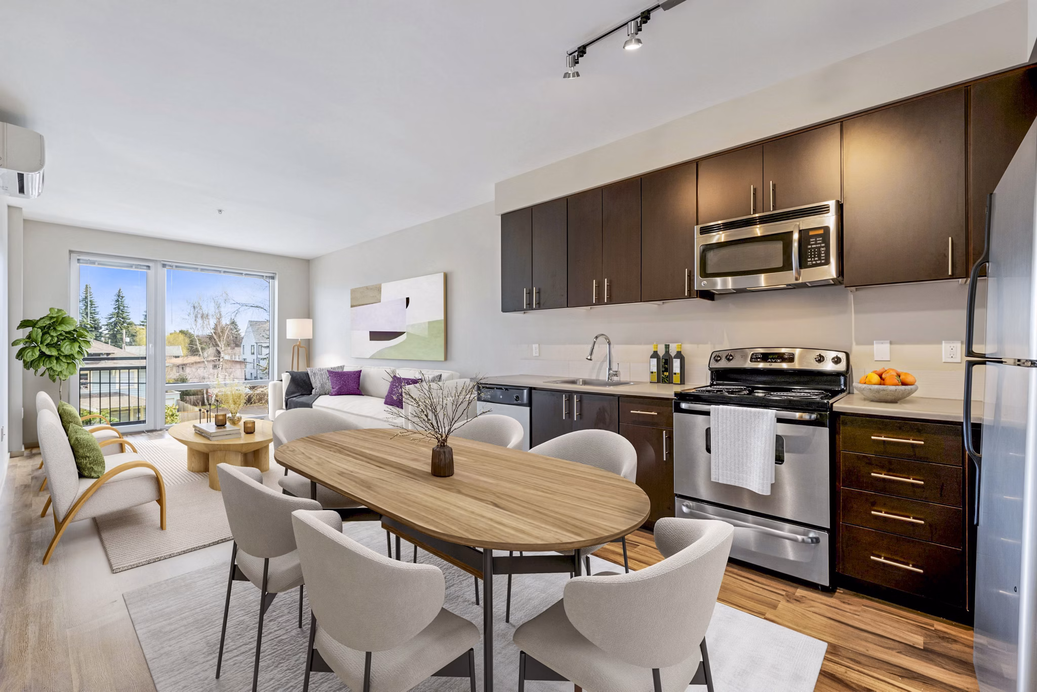 Modern kitchen with stainless steel appliances in Prescott Apartments, luxury living spaces by Greystar