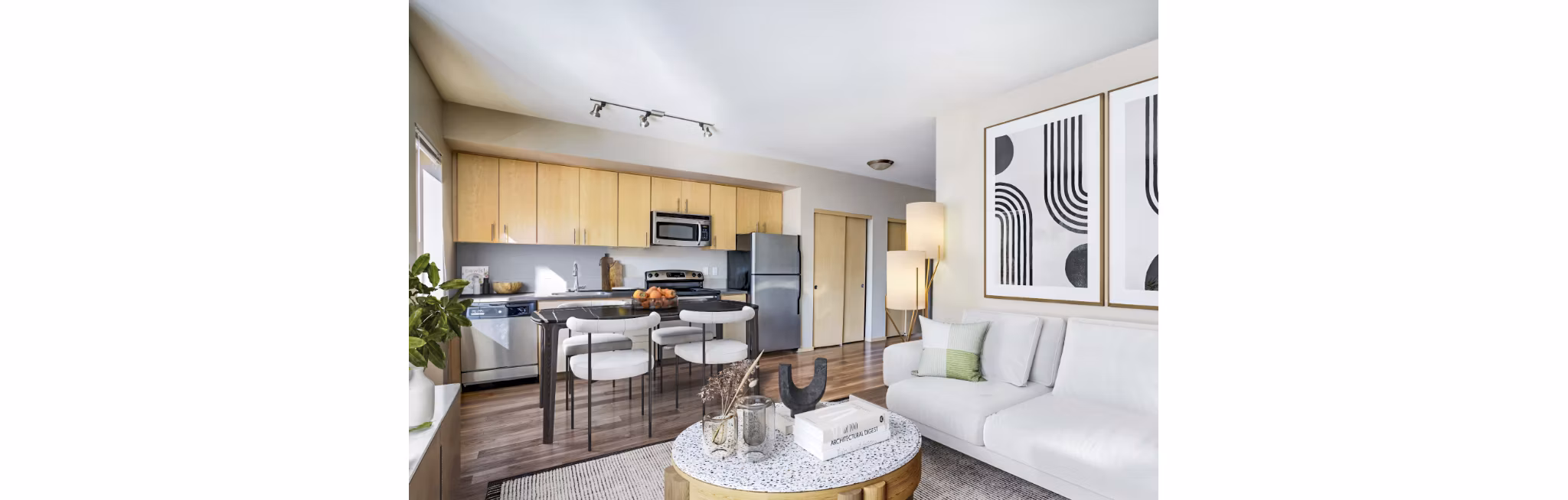 Spacious living room with modern decor at Prescott Apartments, ideal for relaxation and entertaining