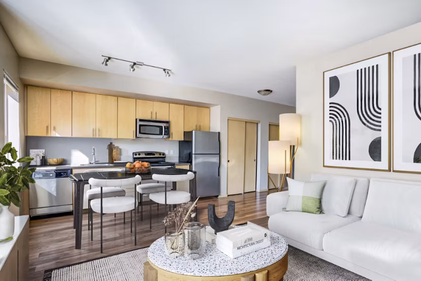Spacious living room with modern decor at Prescott Apartments, ideal for relaxation and entertaining