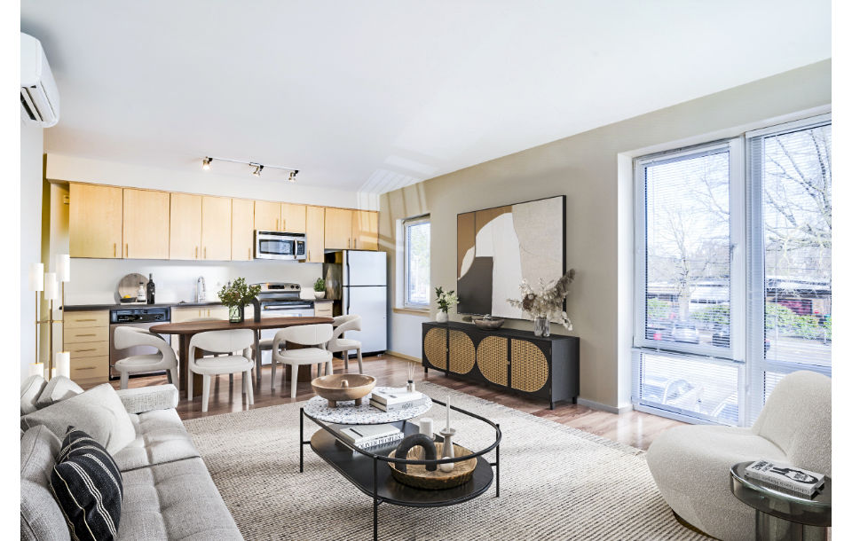 Modern living room with large windows and elegant decor at Prescott Apartments, a luxury residence