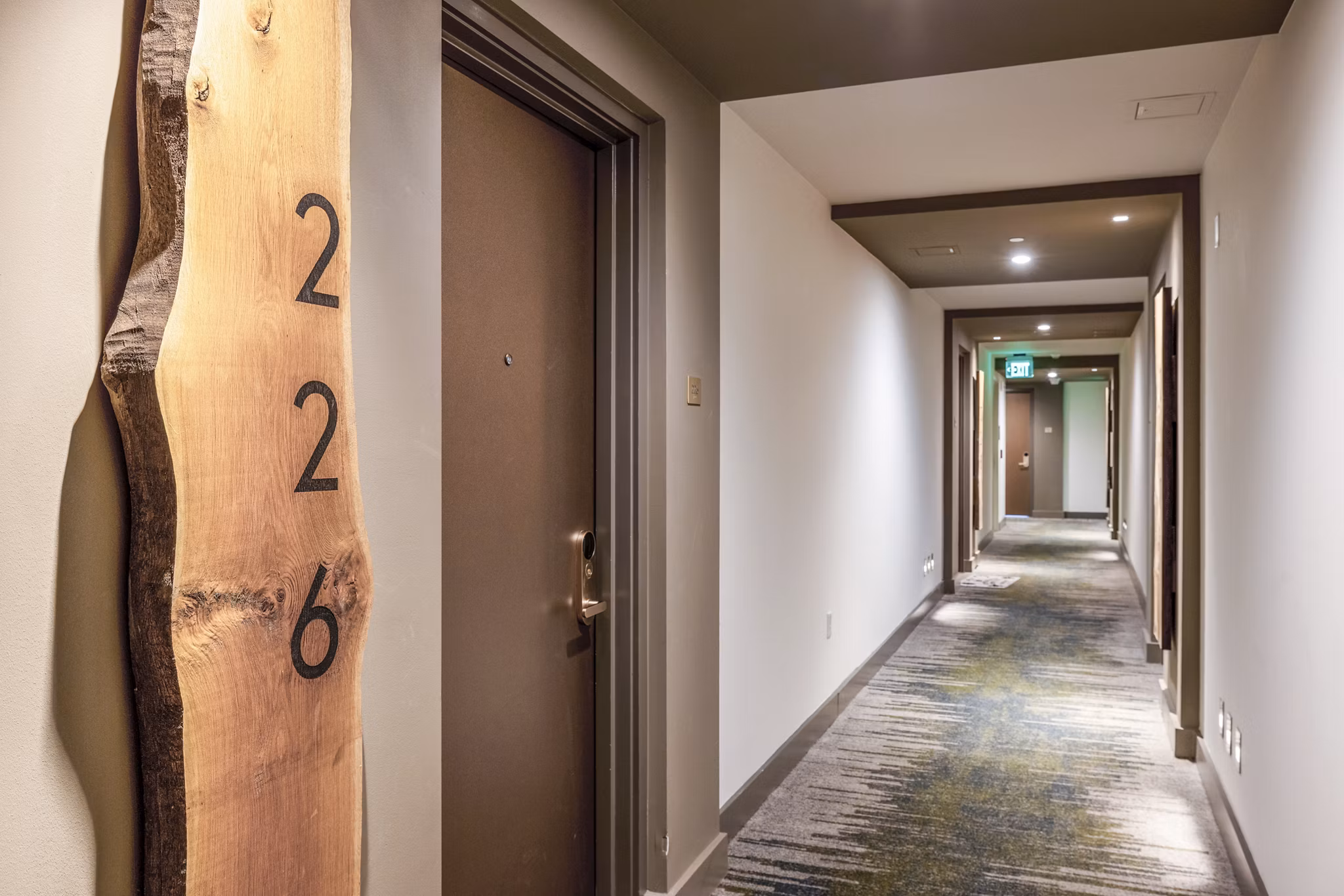 Clubhouse featuring modern design and seating areas at The Sur Apartments