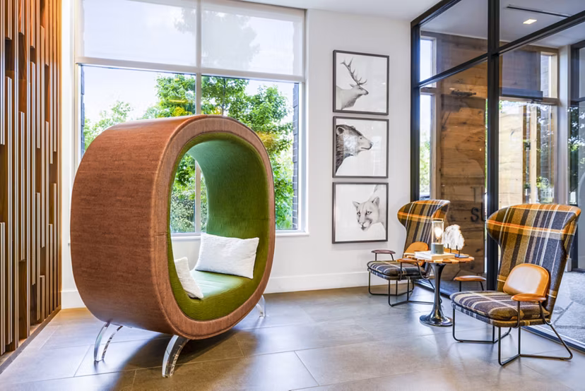 Clubhouse featuring modern design and social spaces at The Sur Apartments