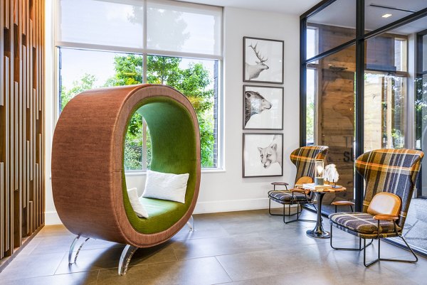 Clubhouse featuring modern design and social spaces at The Sur Apartments