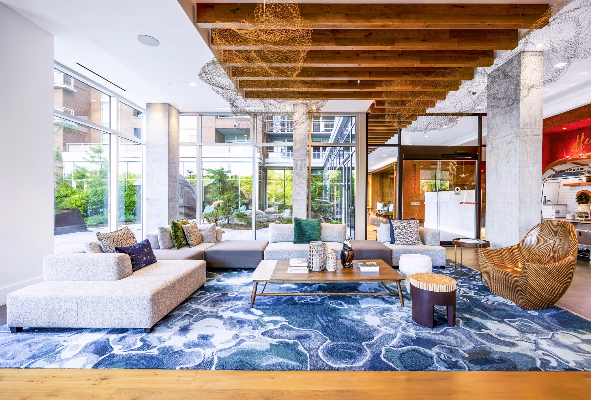 Clubhouse featuring modern design and coworking spaces at The Sur Apartments