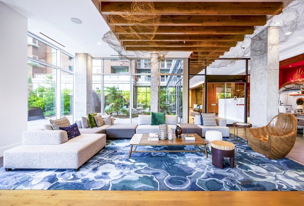 Clubhouse featuring modern design and coworking spaces at The Sur Apartments