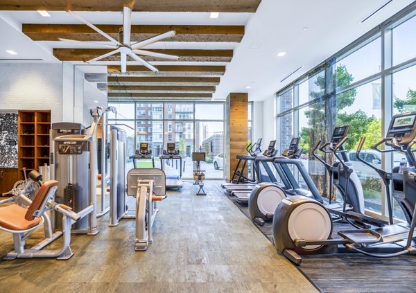 State-of-the-art fitness center with modern equipment at The Sur Apartments