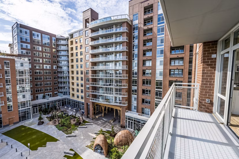 Private balcony with scenic views at The Sur Apartments, luxury living space ideal for relaxation and entertainment