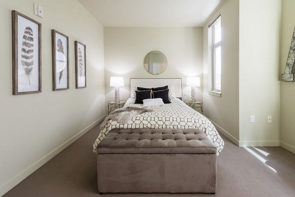 Modern bedroom with stylish decor at Thornton Place Apartments