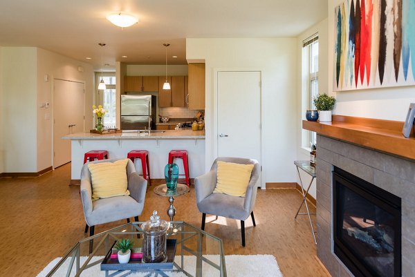 Spacious living room with modern furnishings at Thornton Place Apartments