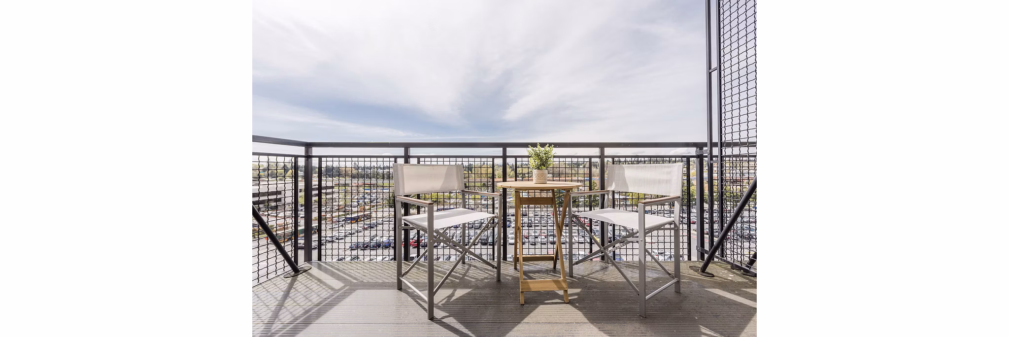Scenic patio with modern seating at Thornton Place Apartments