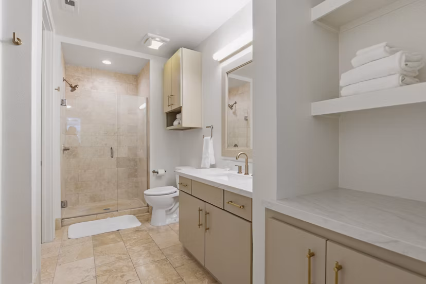 Modern bathroom with sleek fixtures at mResidences Miracle Mile Apartments