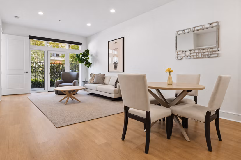 Dining area with modern furnishings at mResidences Miracle Mile Apartments