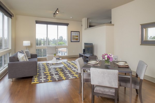 Dining area with modern furnishings at mResidences Miracle Mile Apartments