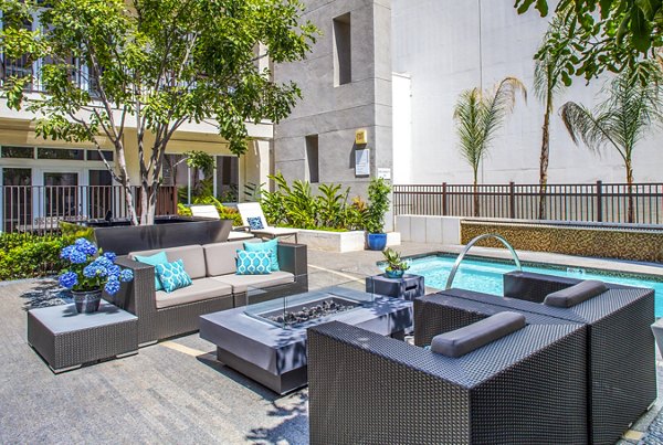 Cozy fire pit and jacuzzi area at mResidences Miracle Mile Apartments