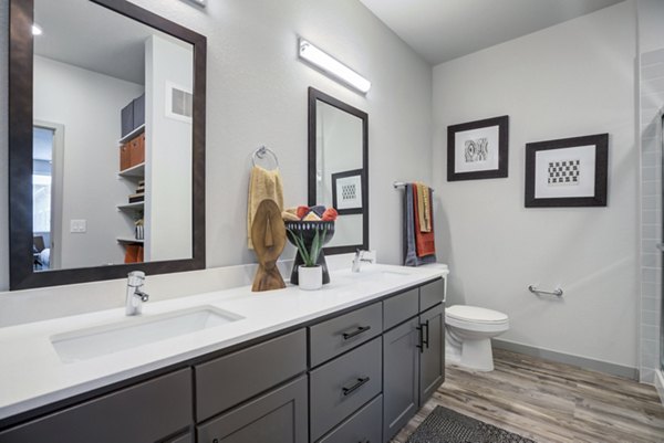 Modern bathroom with sleek fixtures at Outlook Briargate Apartments