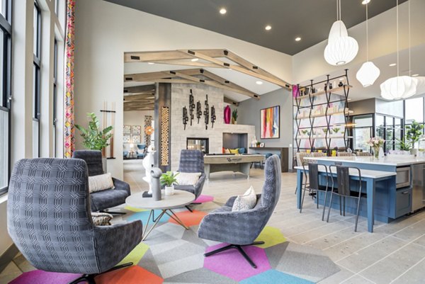 Outlook Briargate Apartments: Modern clubhouse with inviting lounge space and stylish decor, ideal for resident gatherings and events