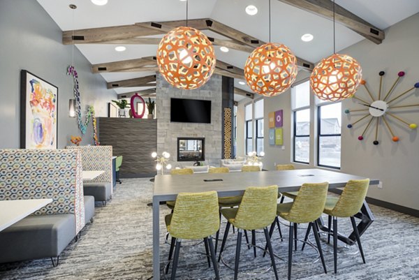 Clubhouse with cozy seating and modern decor at Outlook Briargate Apartments, luxury community living in desirable neighborhood