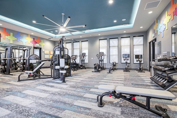 Modern fitness center with state-of-the-art equipment at Outlook Briargate Apartments