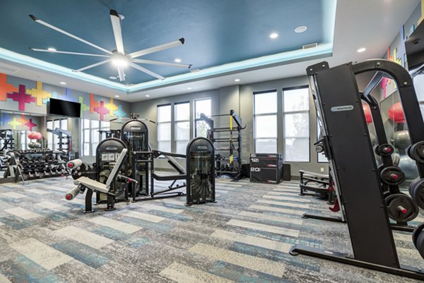 State-of-the-art fitness center with modern equipment at Outlook Briargate Apartments, offering premium workout amenities for residents