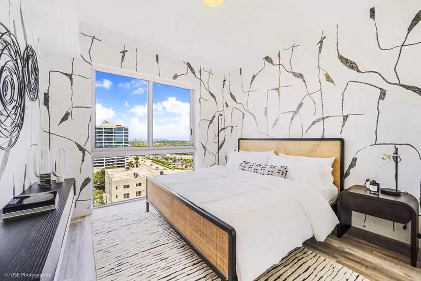 Modern bedroom with stylish decor at Crest at Pinecrest Apartments