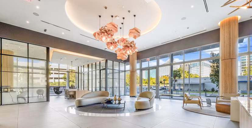 Clubhouse featuring modern design and spacious seating at Beckon Apartments, a Greystar luxury community