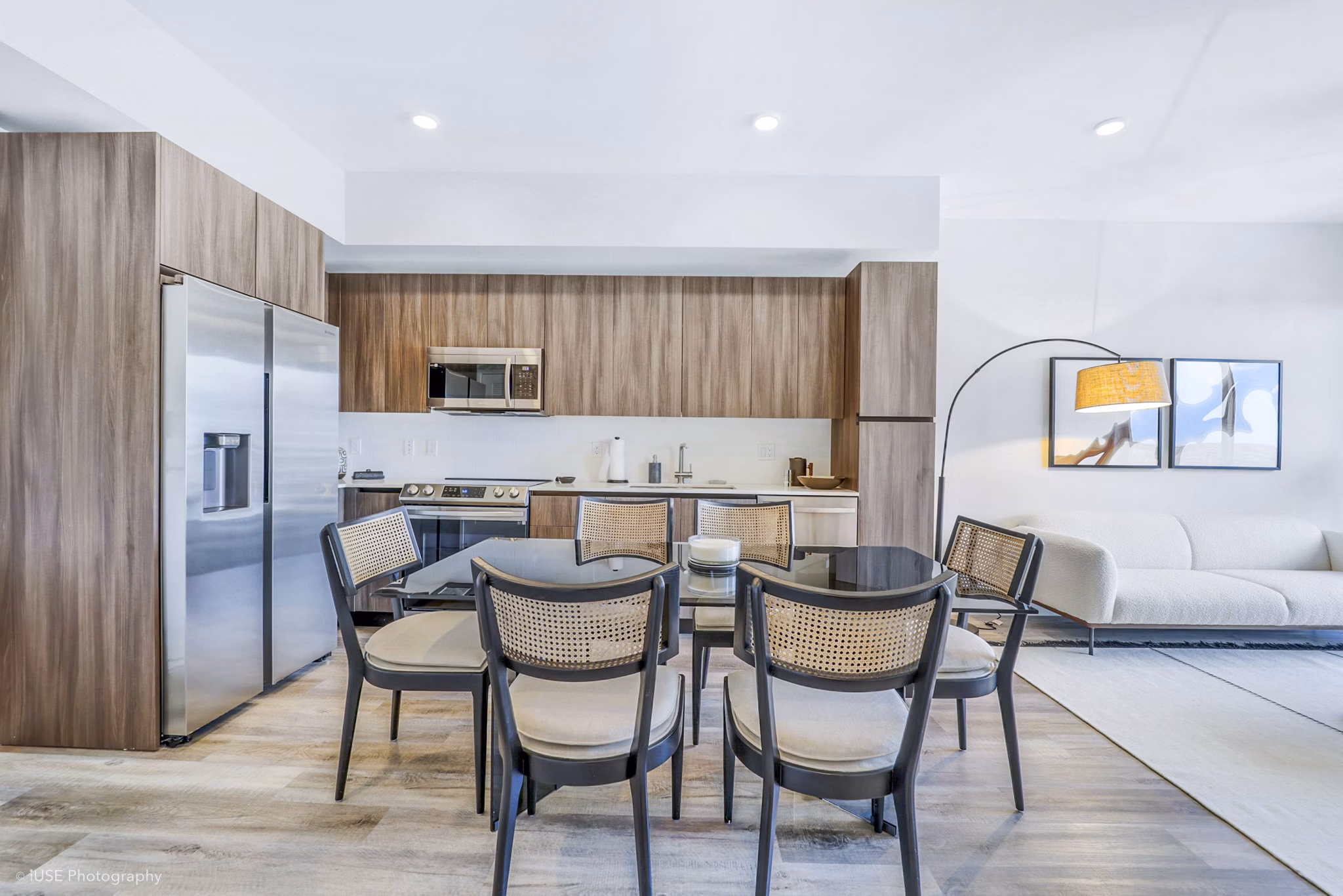 Dining area featuring modern decor and large windows at Crest at Pinecrest Apartments