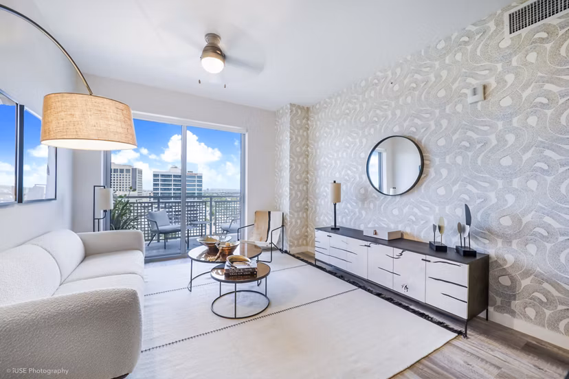 Spacious living room with modern decor at Crest at Pinecrest Apartments