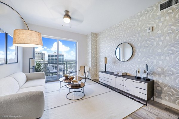 Spacious living room with modern decor at Crest at Pinecrest Apartments