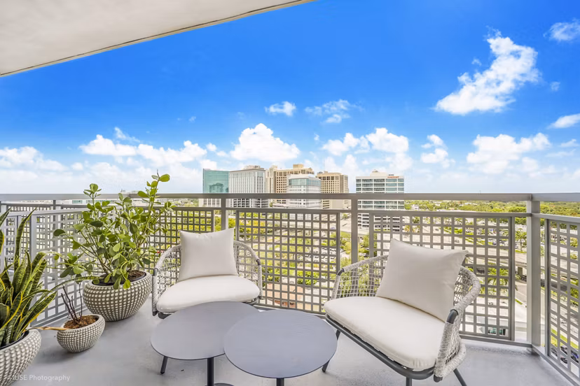 Expansive patio with outdoor seating at Crest at Pinecrest Apartments, perfect for relaxation and enjoying the view