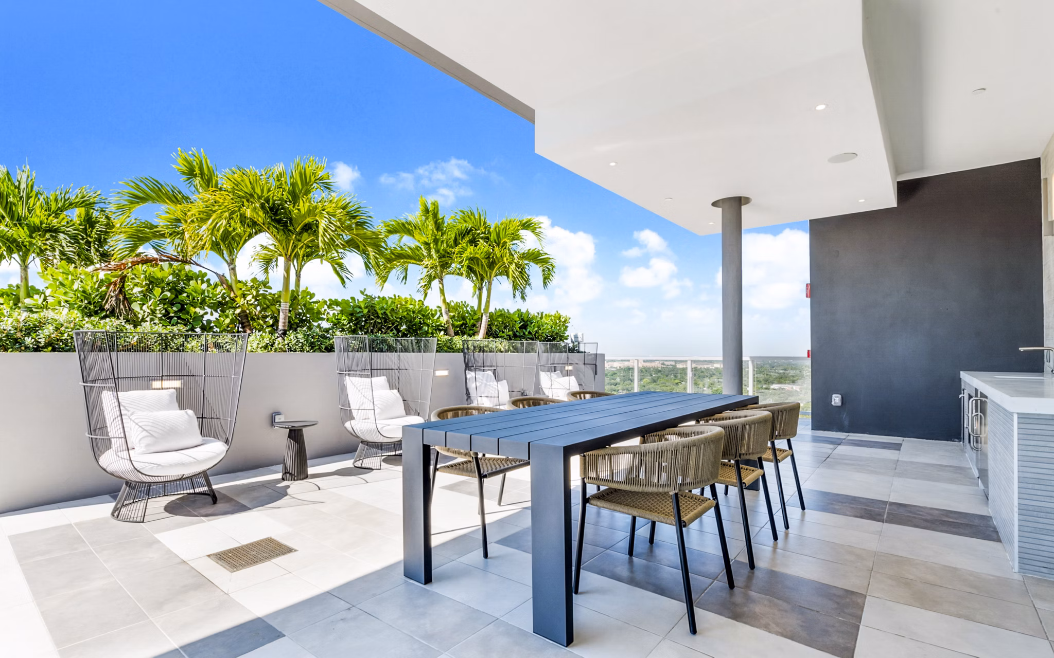 Spacious patio with outdoor seating at Crest at Pinecrest Apartments, perfect for relaxation and gatherings