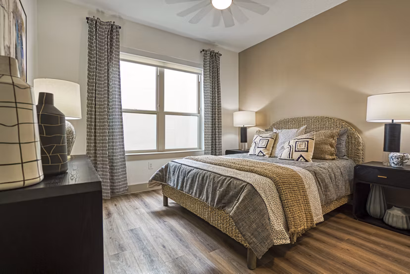 bedroom at Alexan Braker Pointe Apartments