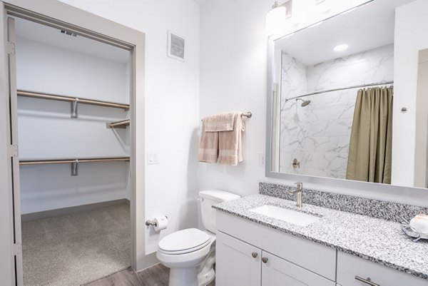 Luxury bathroom with modern fixtures at Alexan Braker Pointe Apartments in Austin